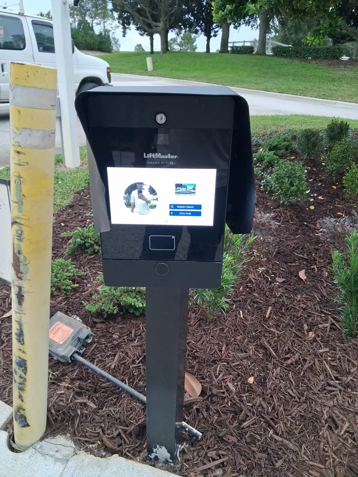 Access control keypad on a pedestal at a drive lane in Groveland, FL