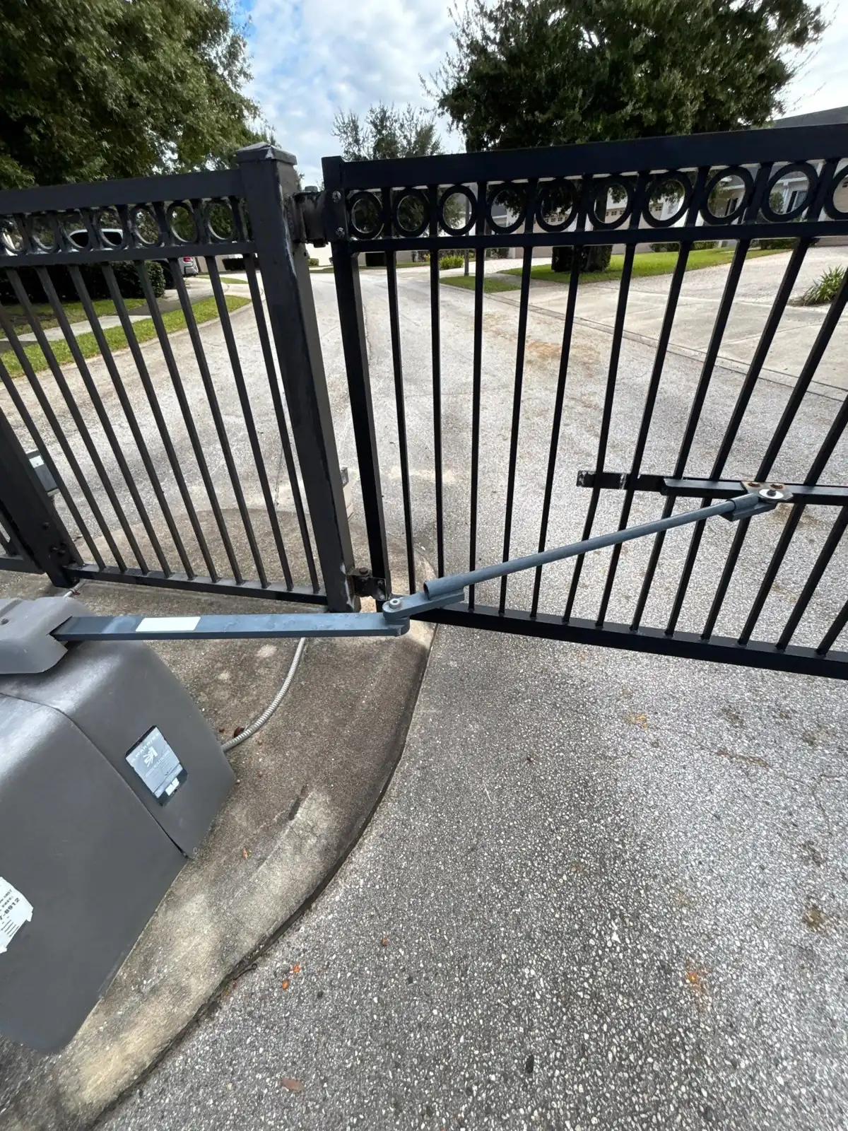 Dual swing gate leaves at a community entry in Groveland, FL
