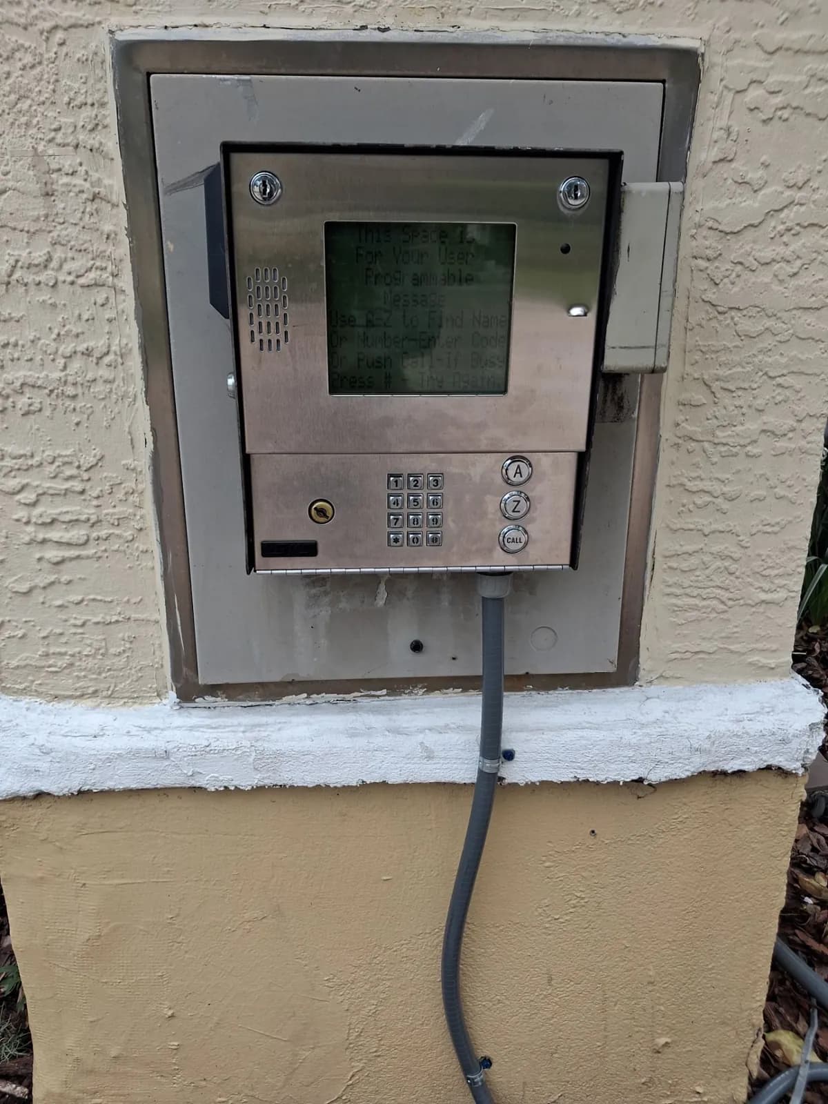 Entry keypad mounted in a column in Orlando, FL