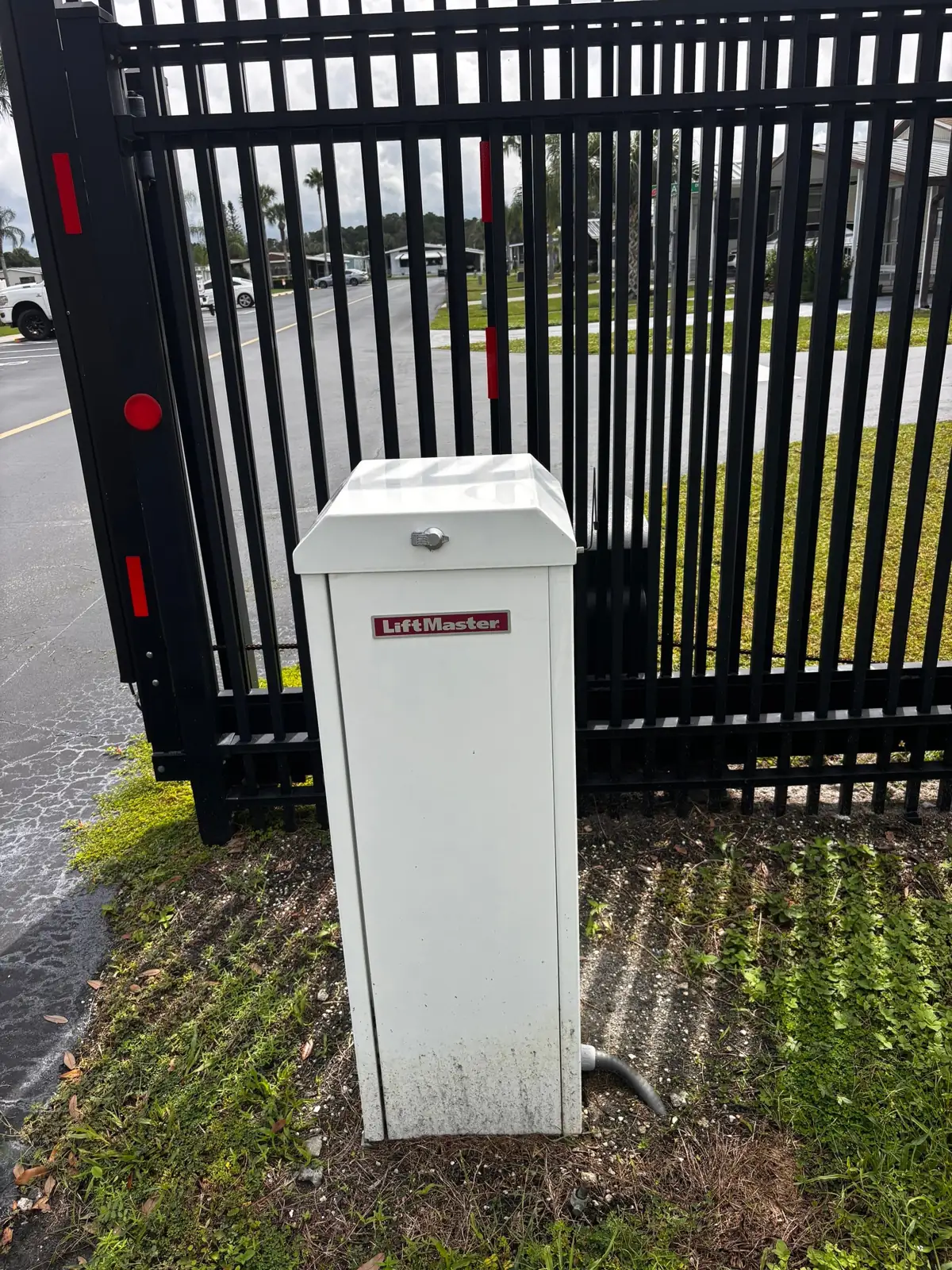 Operator cabinet beside a slide gate in Polk City, FL