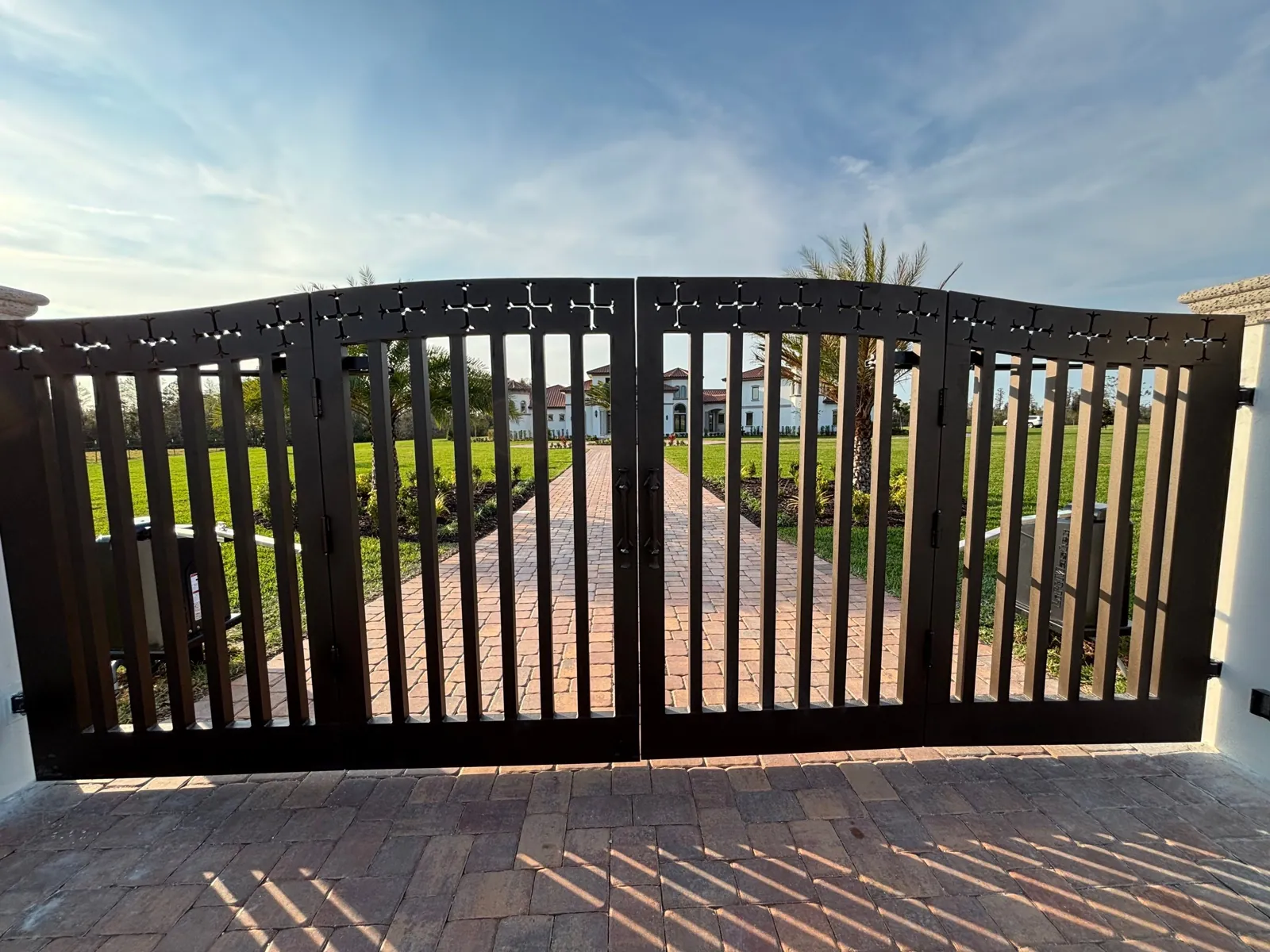 Straight-on view of a finished estate swing gate in Clermont, FL