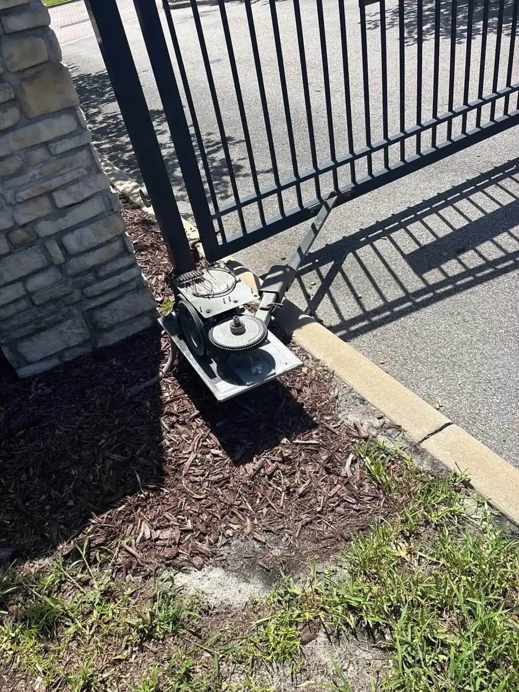 Swing gate operator mounted to a gate arm in Lutz, FL